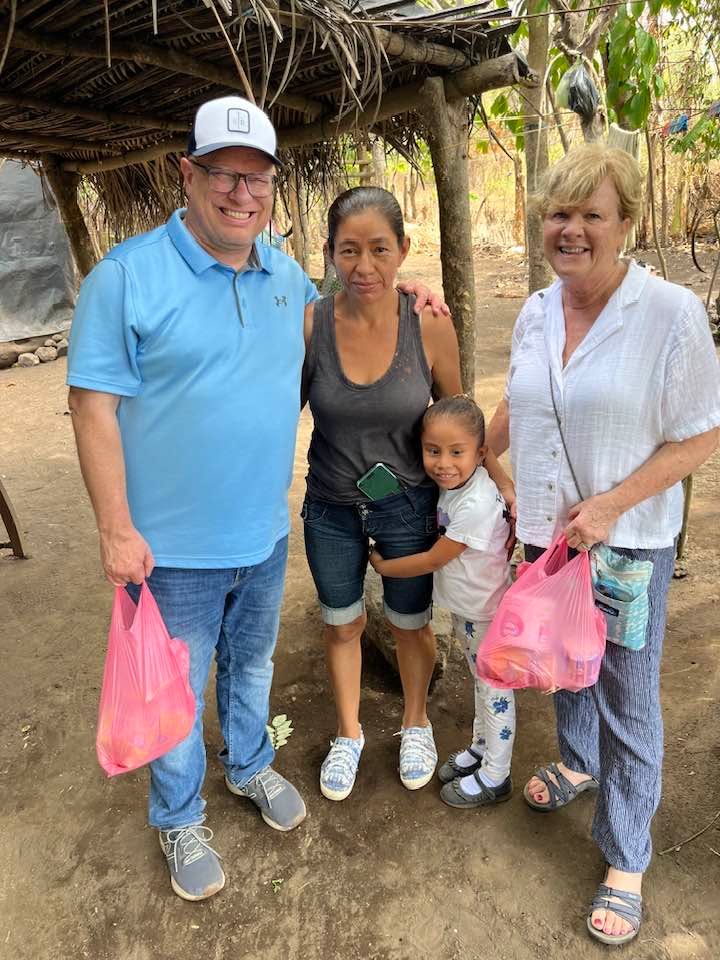 Mission team with a local family